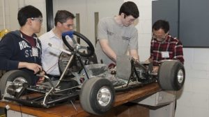 bu-students-working-electrical-system-vehicle-w-raymonds-goncalves.